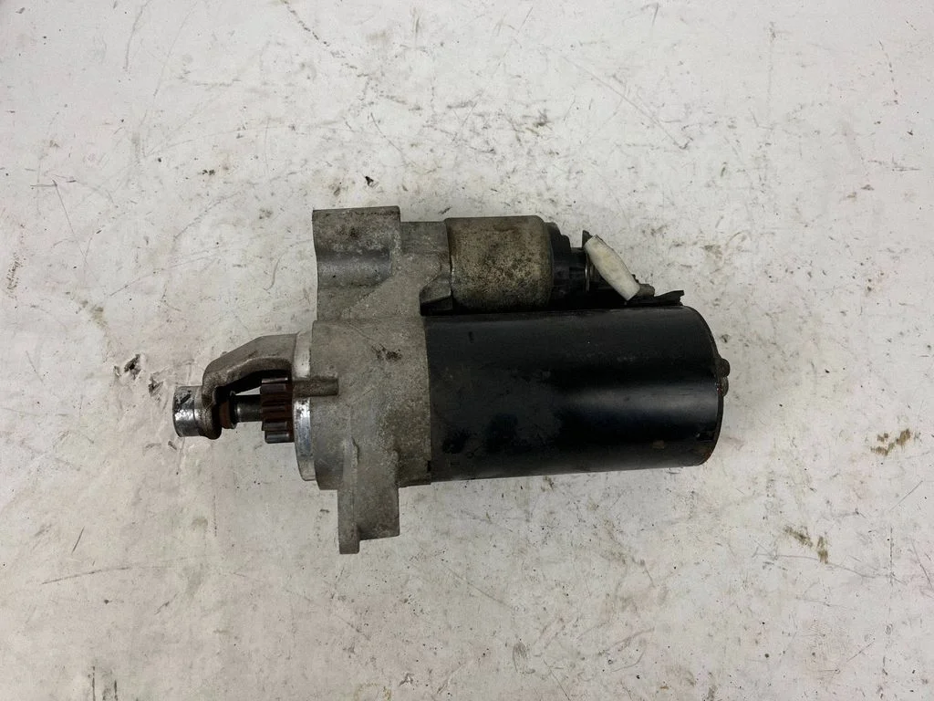 Starter motor 03L911021