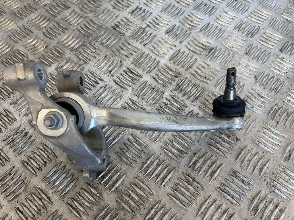Front lower control arm/wishbone – rear left