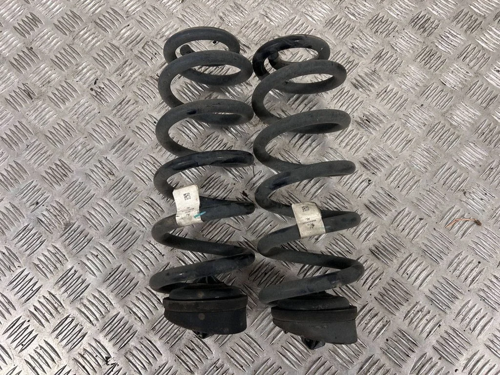Rear coil spring 80A511115