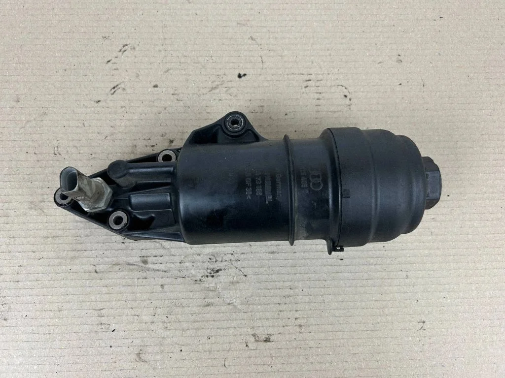 Oil filter mounting bracket 06E115405C