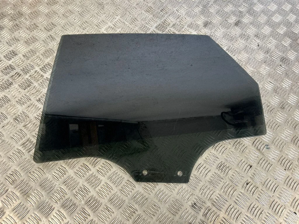 Rear door window glass – left