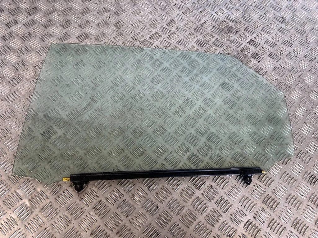 Rear door window glass – left