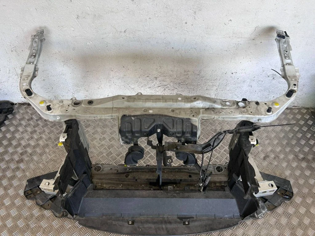 Radiator support slam panel bracket