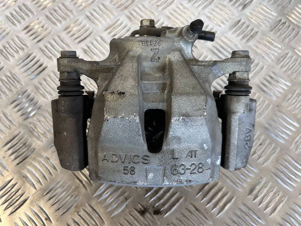 Front brake caliper – left