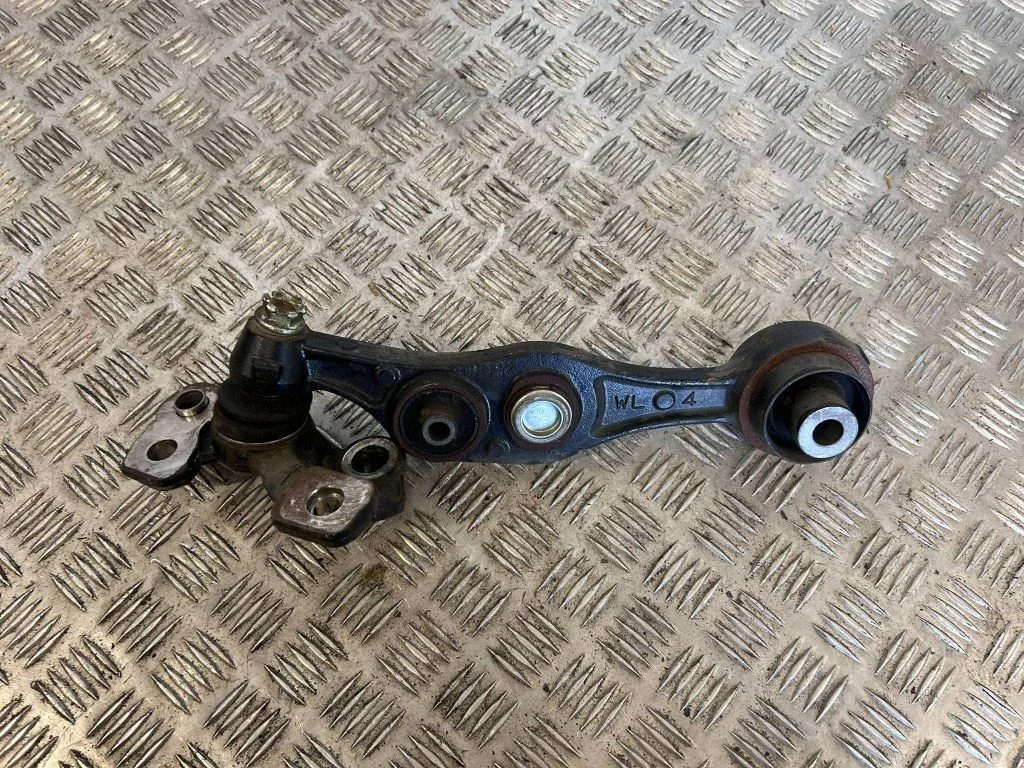 Front lower control arm/wishbone – left