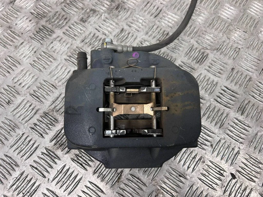 Rear brake caliper – right