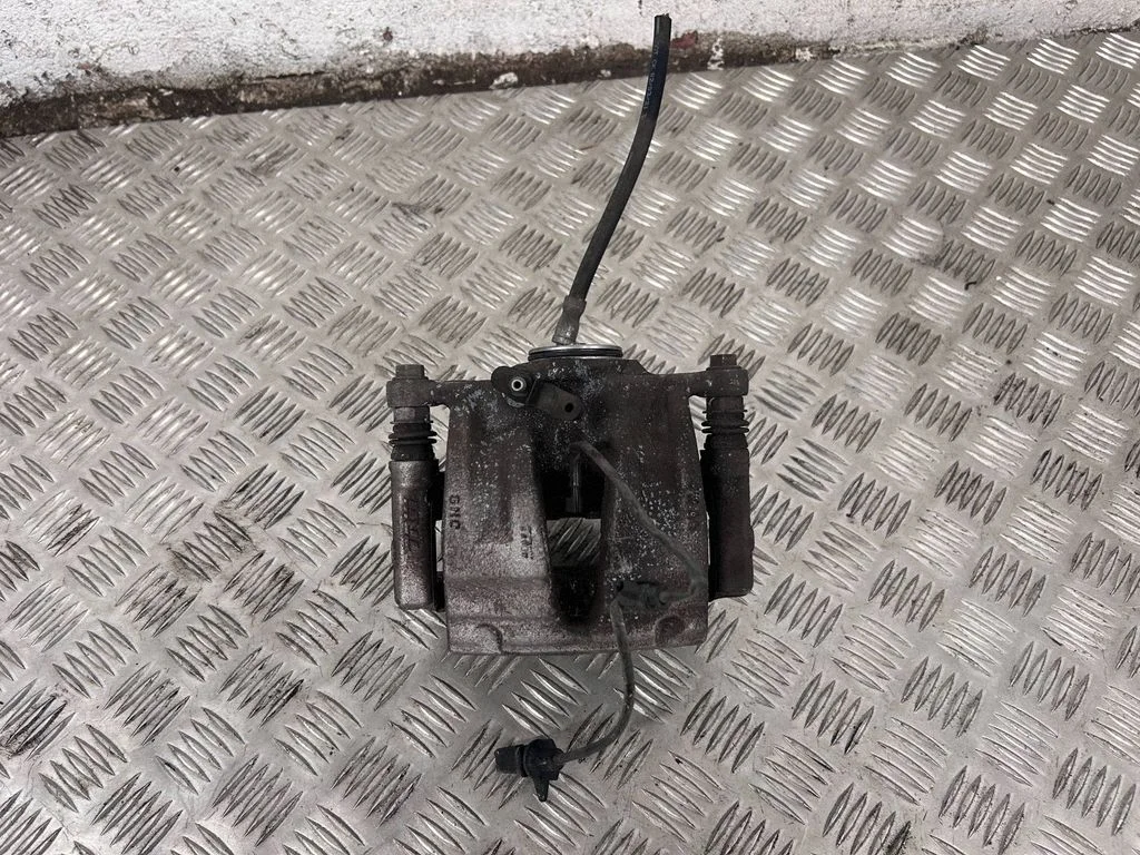 Rear brake caliper – right