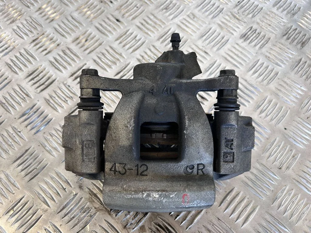 Rear brake caliper – right