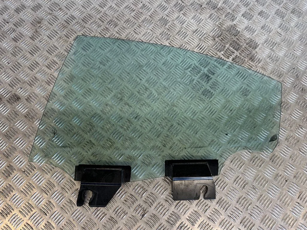 Rear door window glass – left