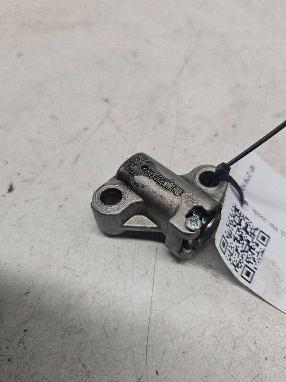 Timing belt/chain tensioner