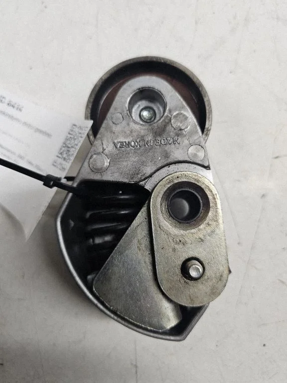 Timing belt/chain tensioner