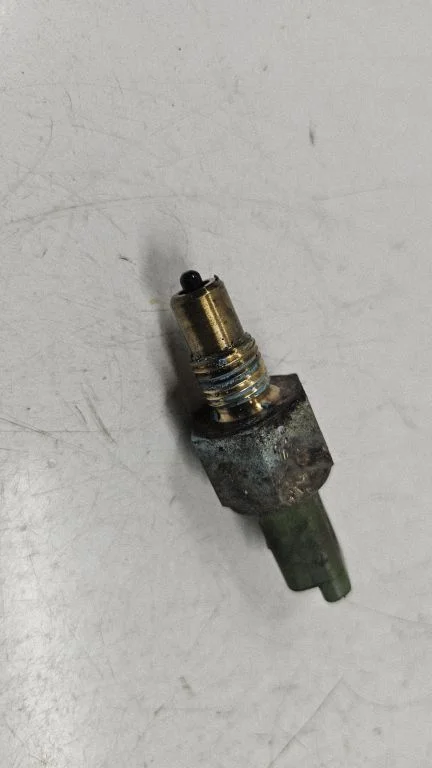 Reversing light switch sensor