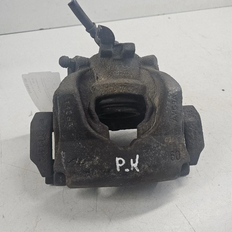 Front brake caliper – left