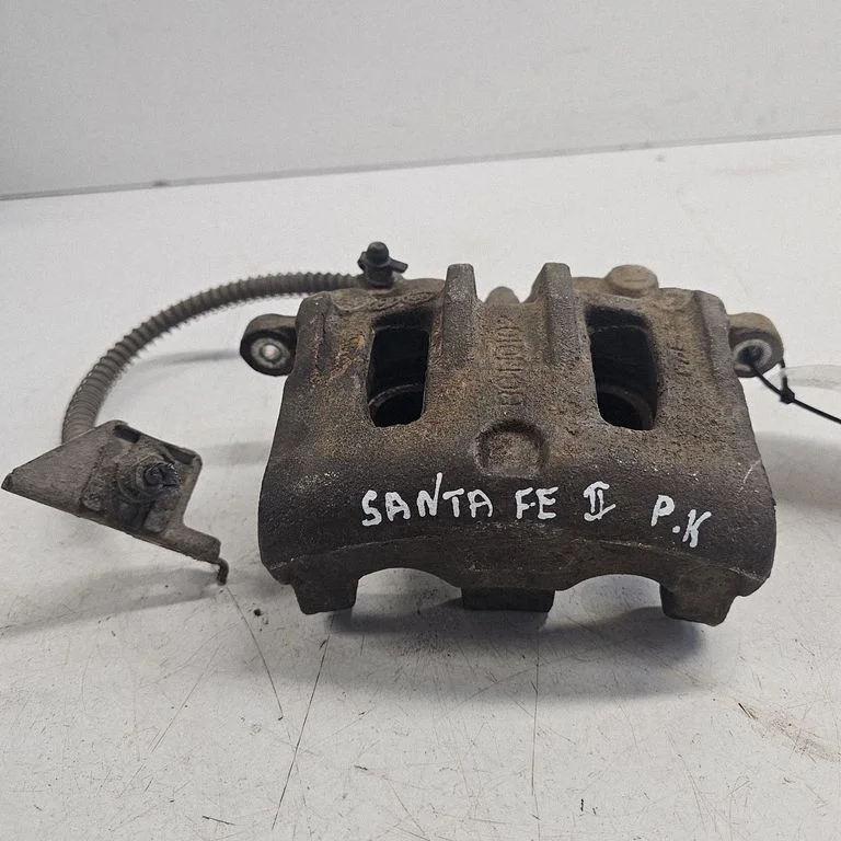 Front brake caliper – right