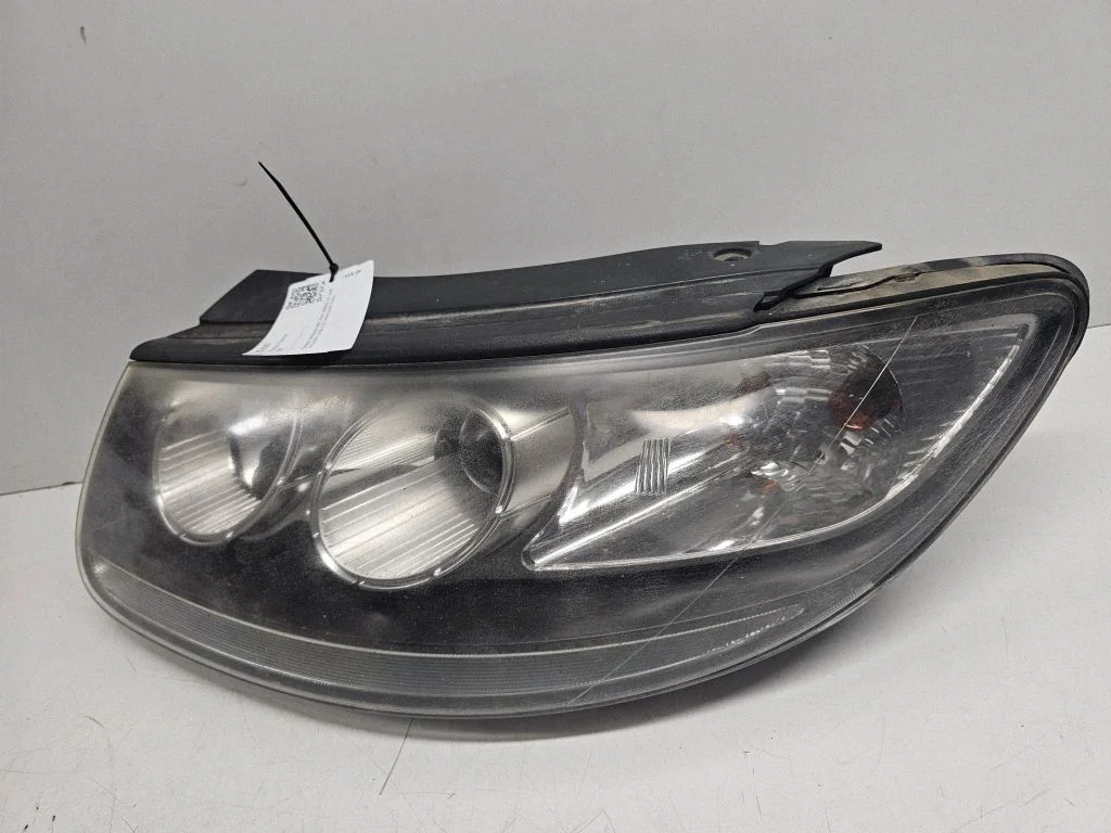 Headlight/headlamp – left
