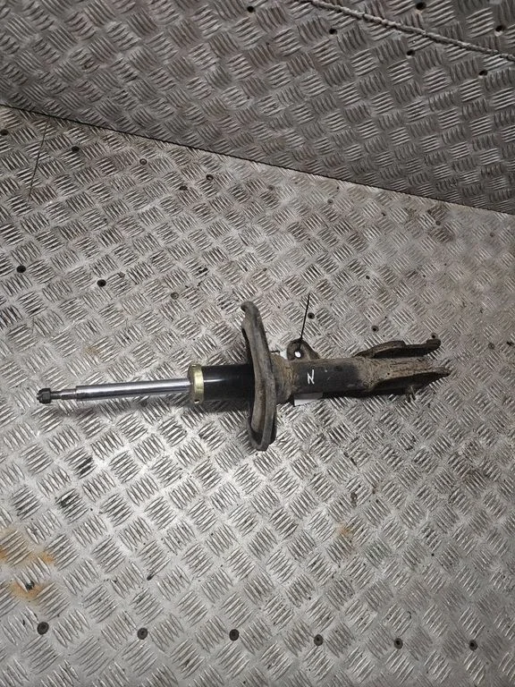 Front shock absorber/damper – left