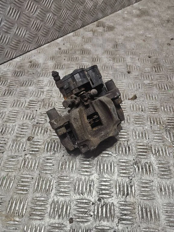 Rear brake caliper FK722K327BC