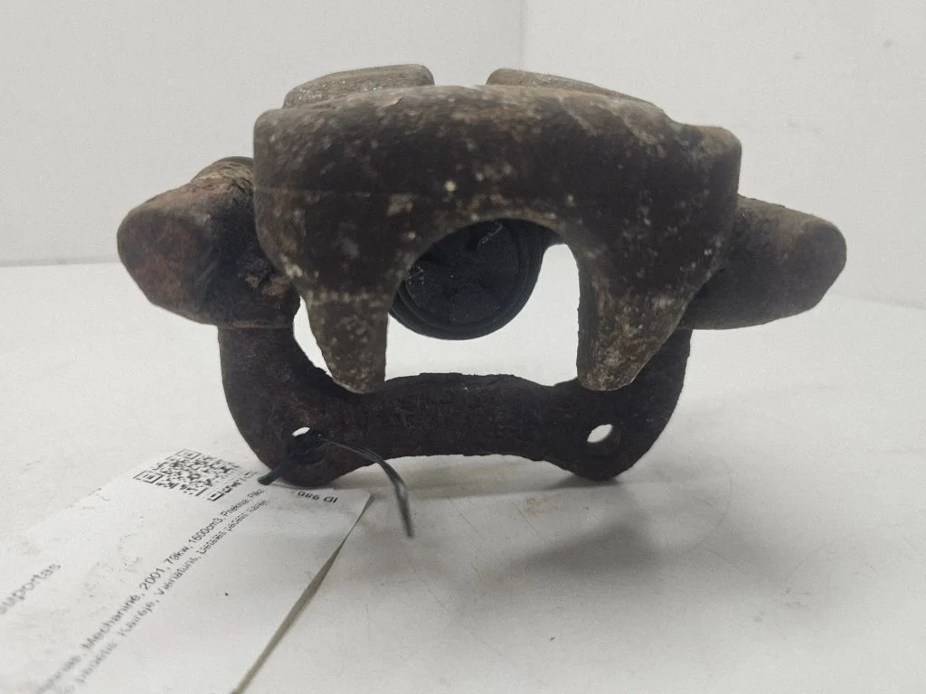Rear brake caliper – left