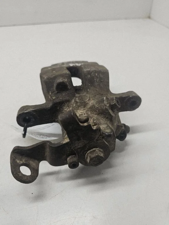 Rear brake caliper – left