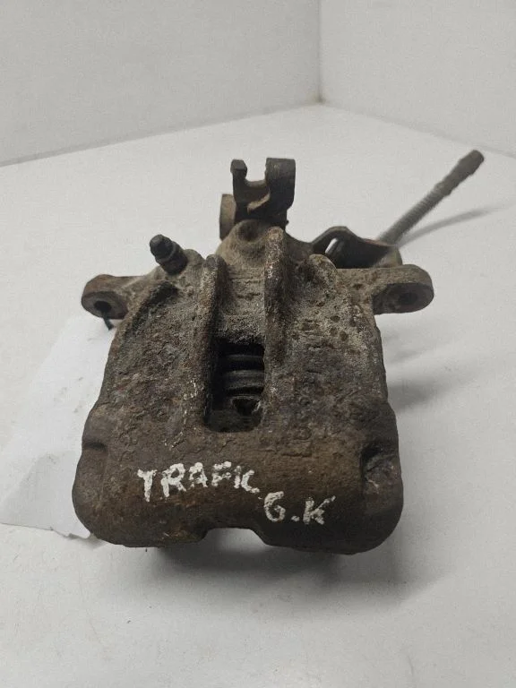 Rear brake caliper – left