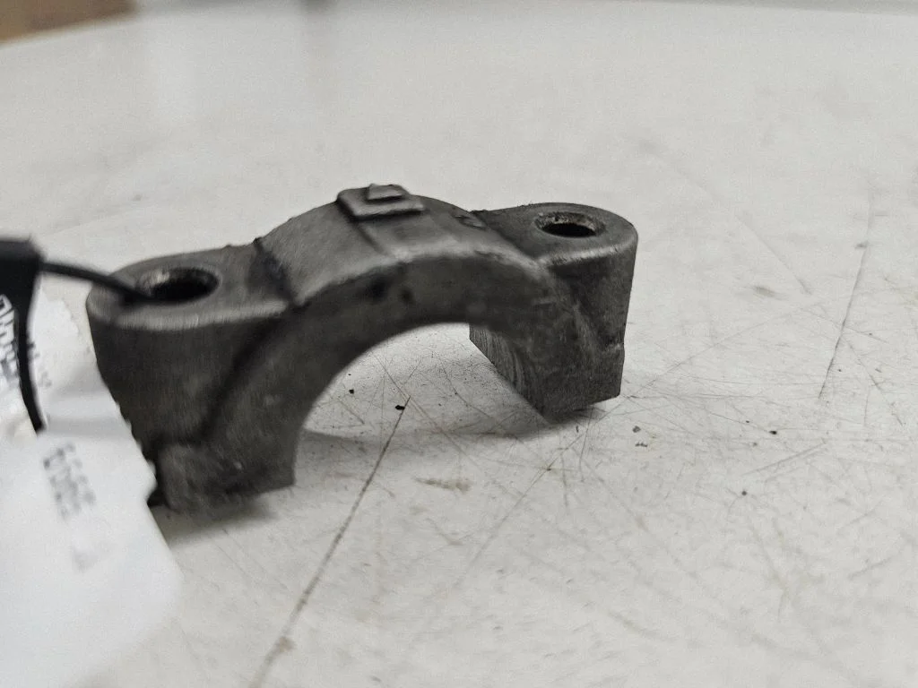 Paskirstymo velenėlio laikiklis