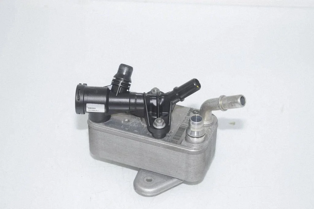 Oil filter mounting bracket 8512435