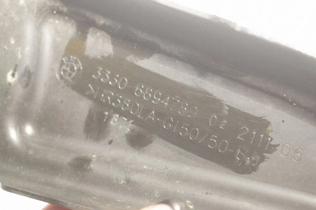 Kita galinės važiuoklės detalė
