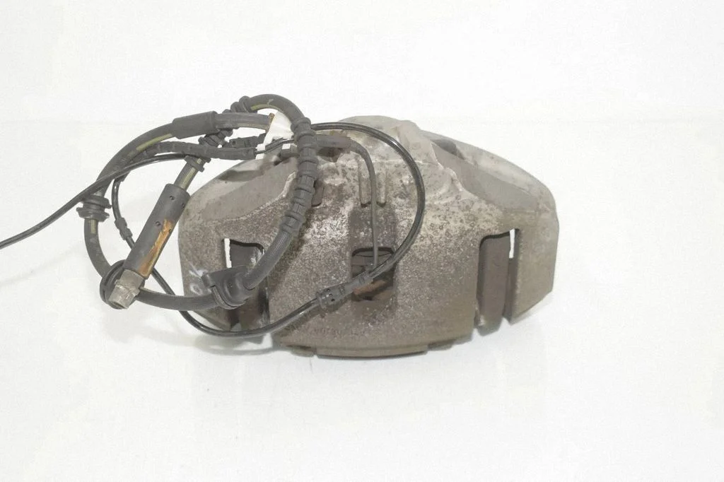 Front brake caliper 6792689