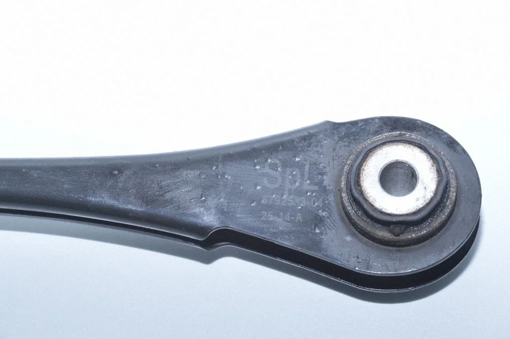 Rear upper control arm/wishbone – left