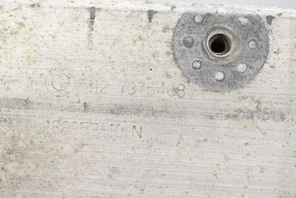 Rear bumper mounting bracket 7375468