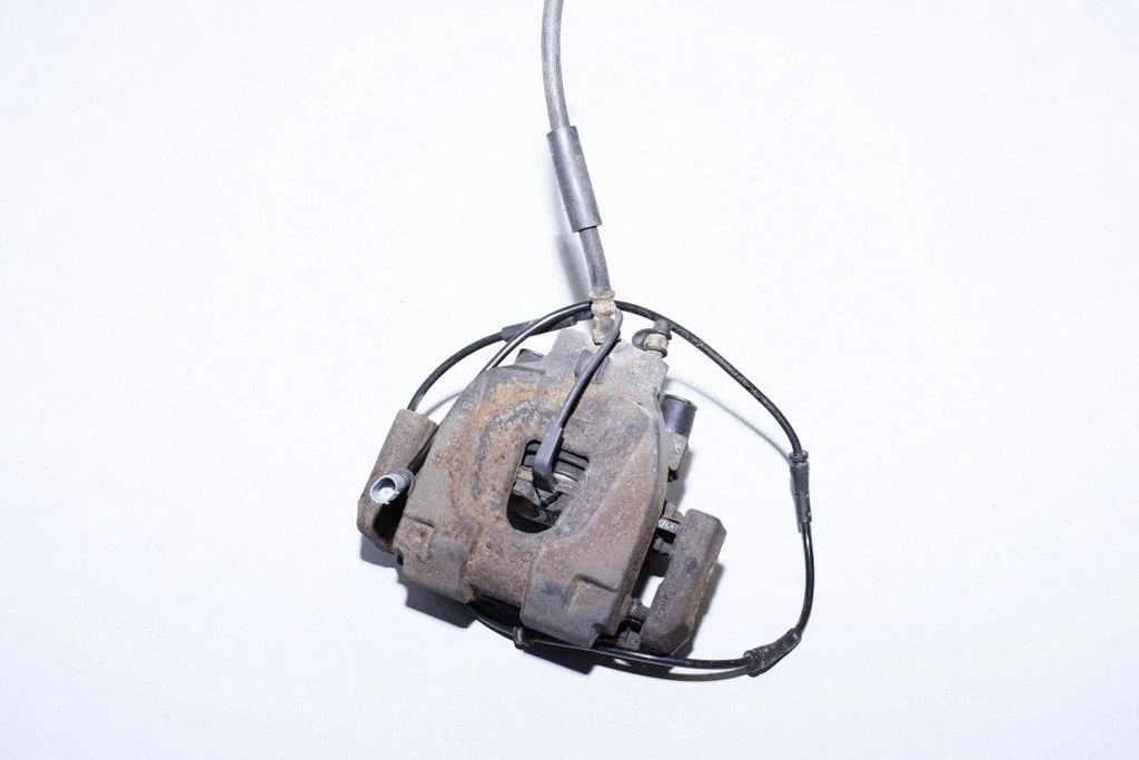 Rear brake caliper – right