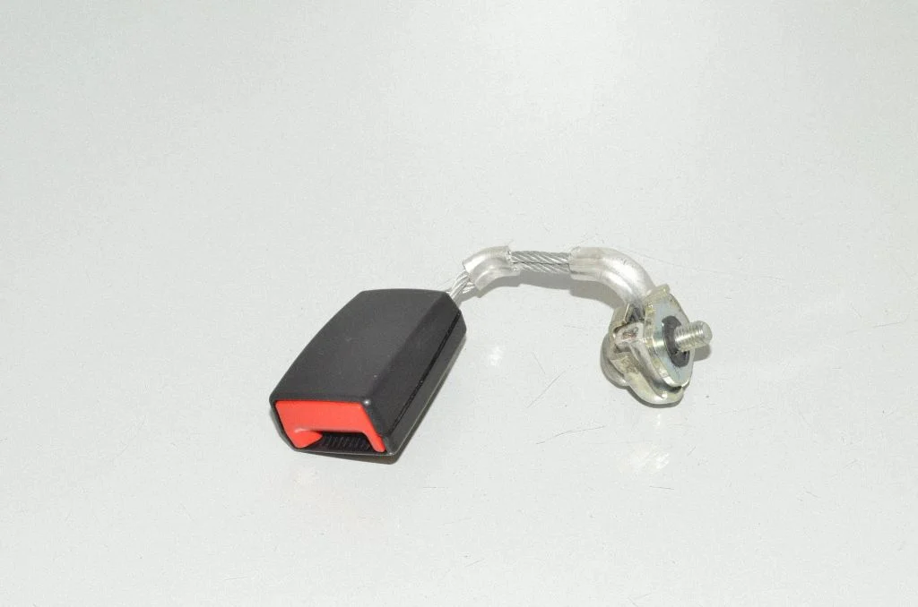 Rear seatbelt buckle – left