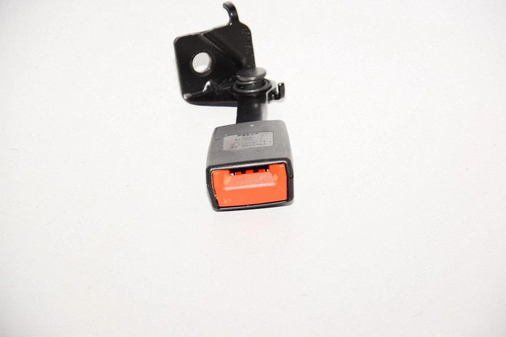 Rear seatbelt buckle – right