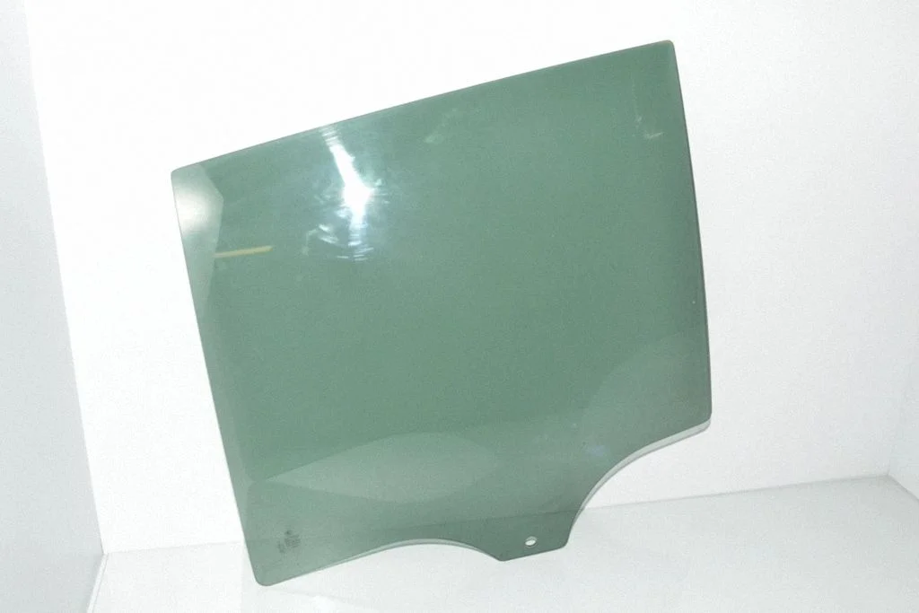 Rear door window glass – left