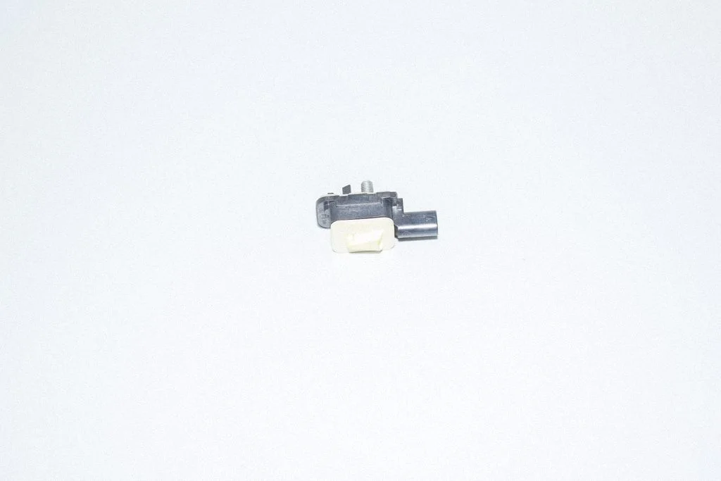 Airbag deployment crash/impact sensor – left