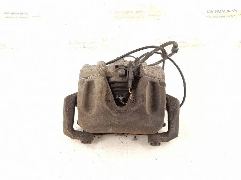 Front brake caliper – right