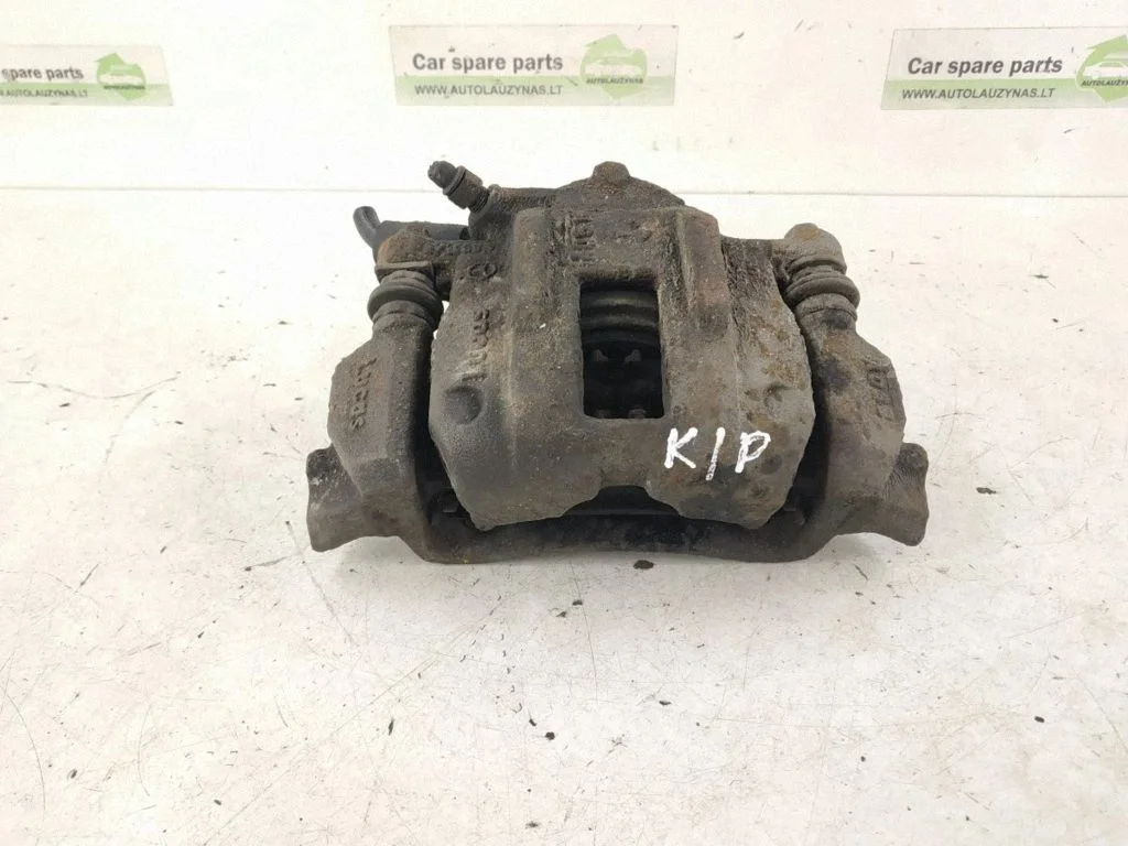 Front brake caliper – left