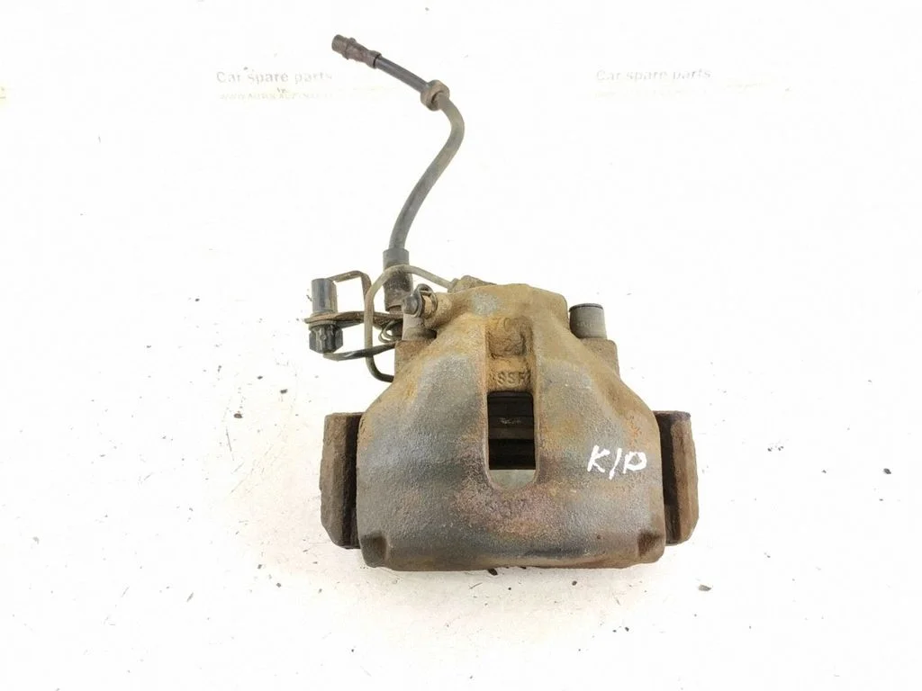Front brake caliper – left