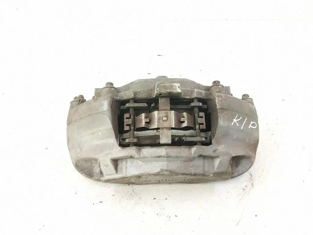 Front brake caliper – left