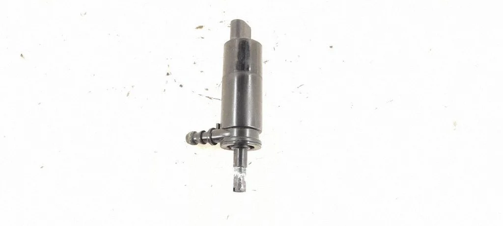 Headlight washer spray nozzle
