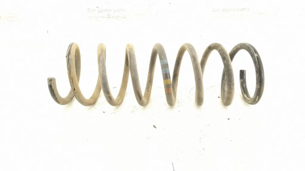 Rear coil spring – rear left