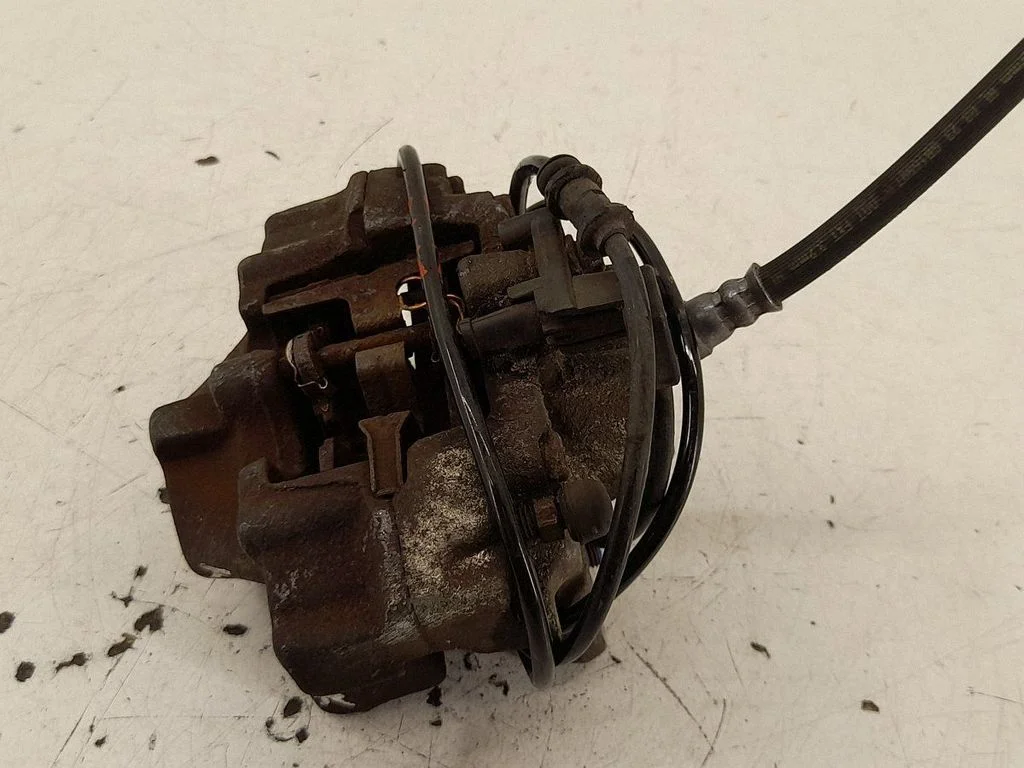 Rear brake caliper – right