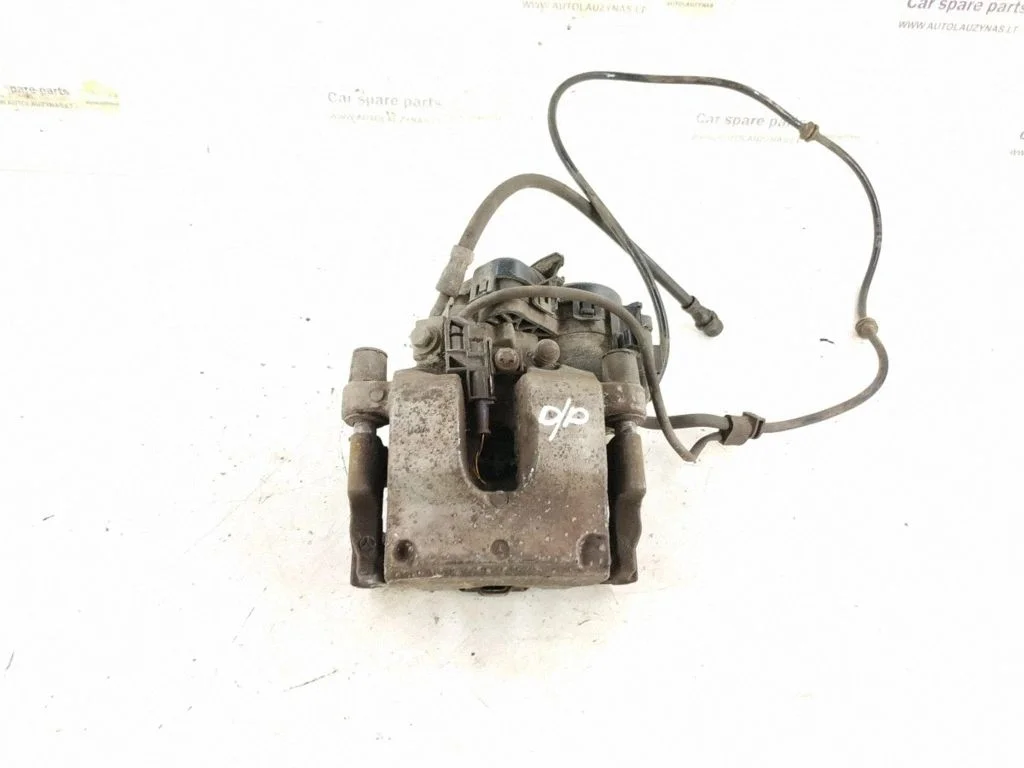 Rear brake caliper – right