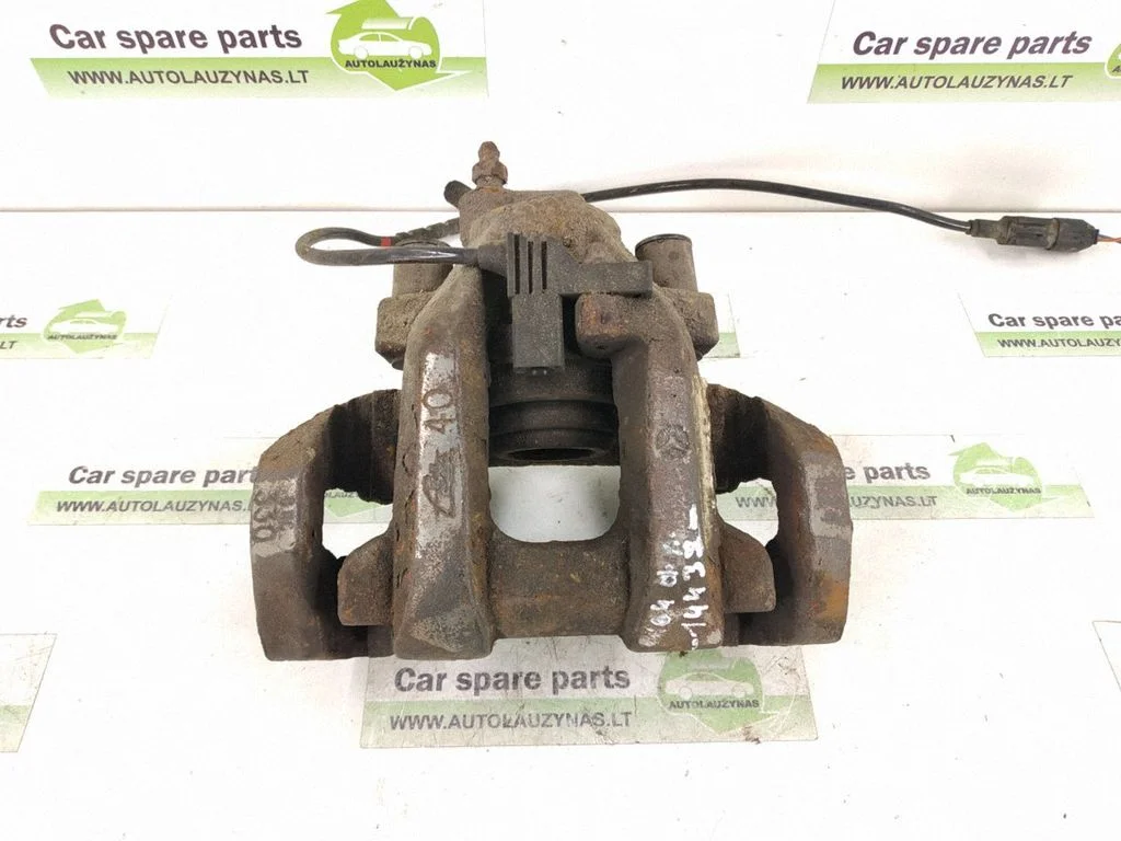 Rear brake caliper – right