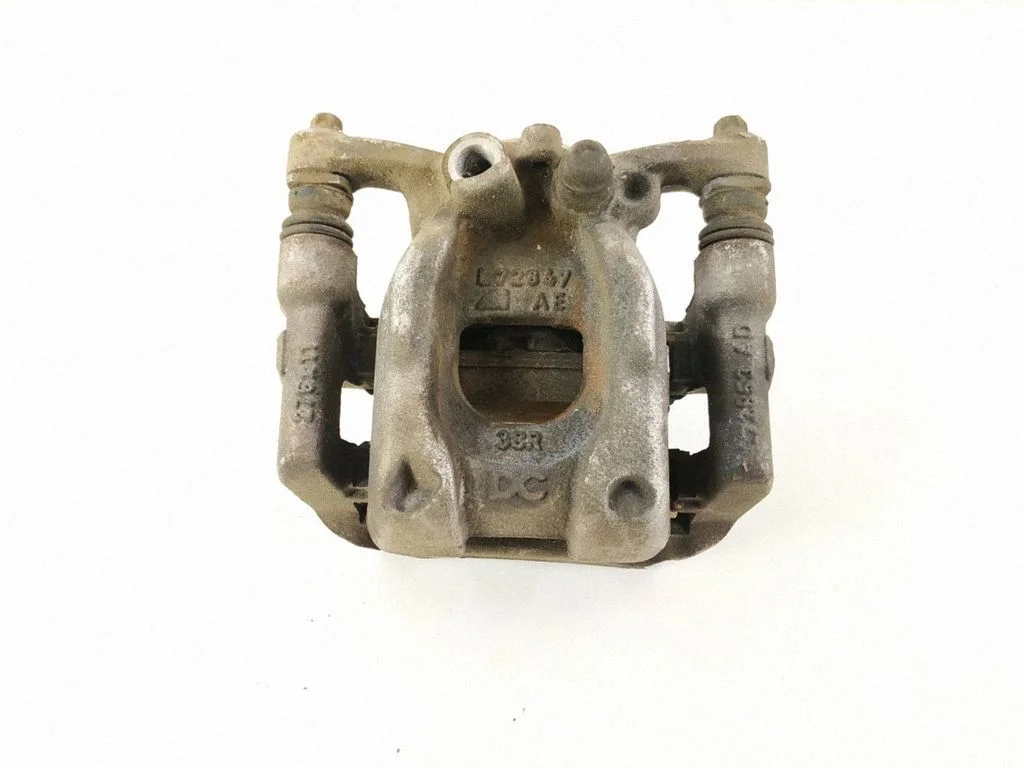Rear brake caliper – right