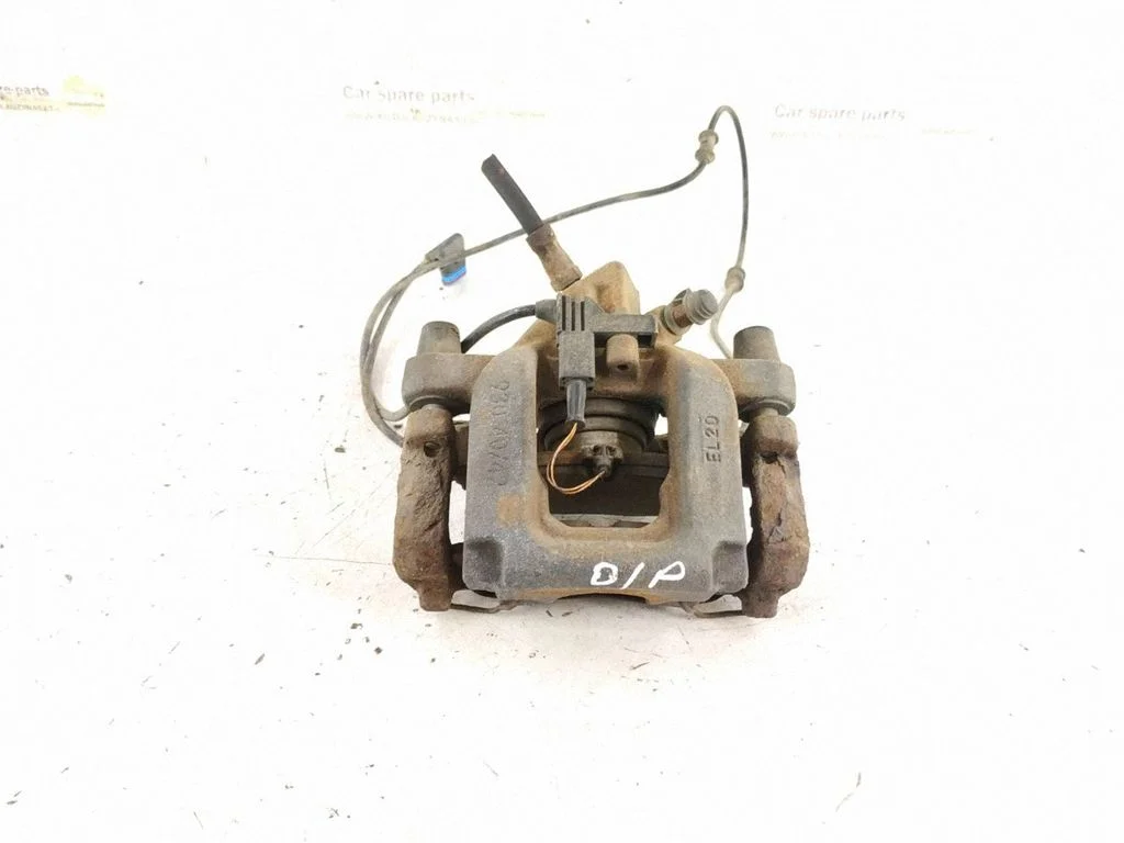 Rear brake caliper – right