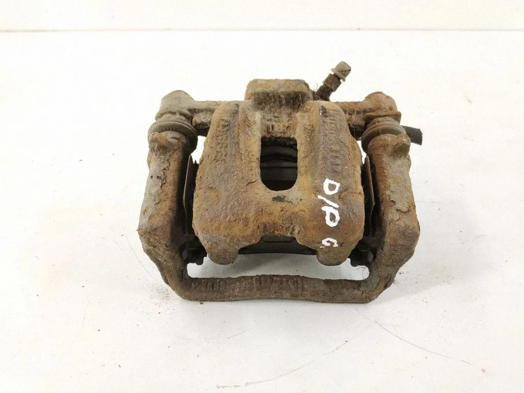 Rear brake caliper – right
