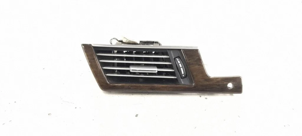 Dashboard side air vent grill/cover trim – front left