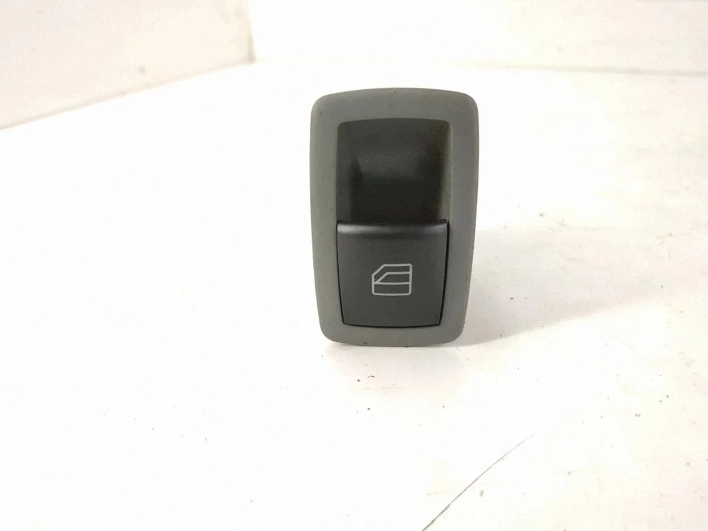 Electric window control switch – rear left