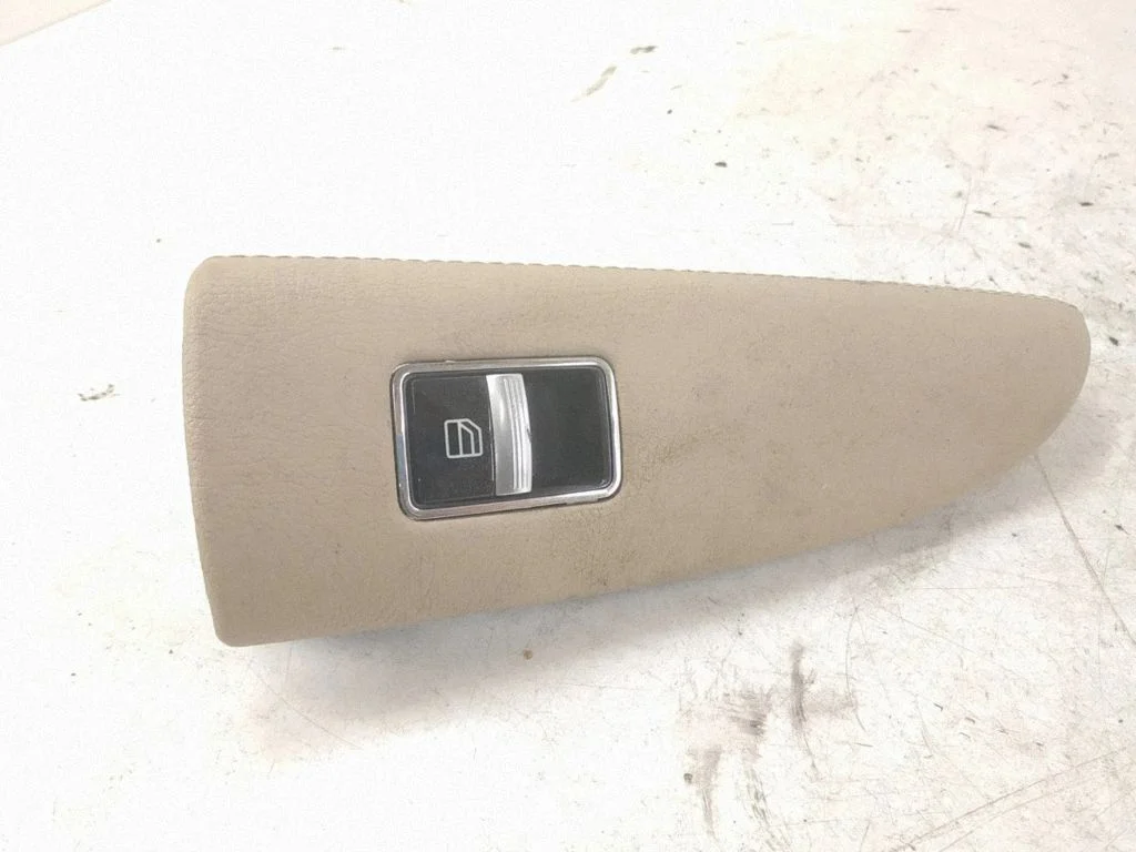 Electric window control switch – rear left